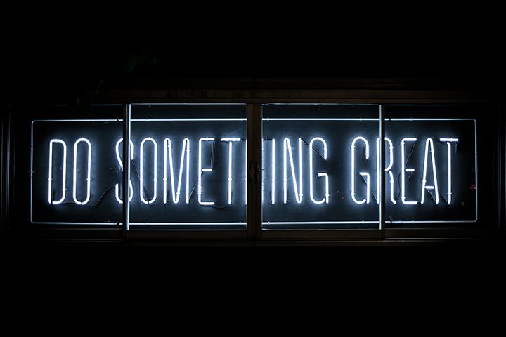 Neon sign that reads, "DO SOMETHING GREAT"