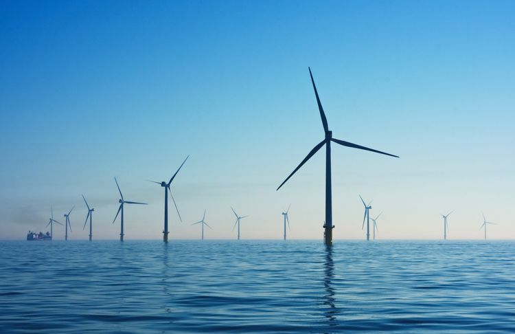 Windmills in the ocean generating renewable energy
