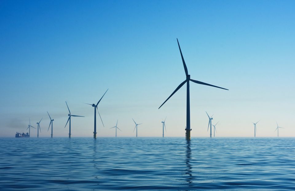 Windmills in the ocean generating renewable energy