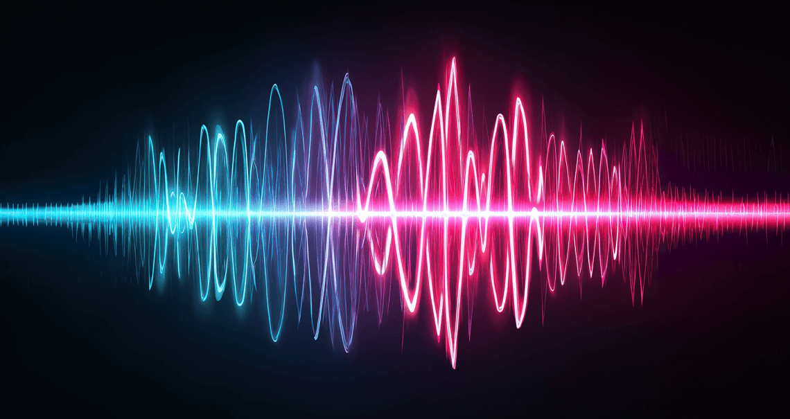 Blue wavy neon line blending into a pink wavy neon line against a black background